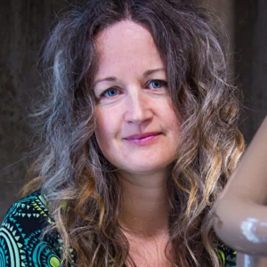 Corinne Fowler, a woman with long brown hair