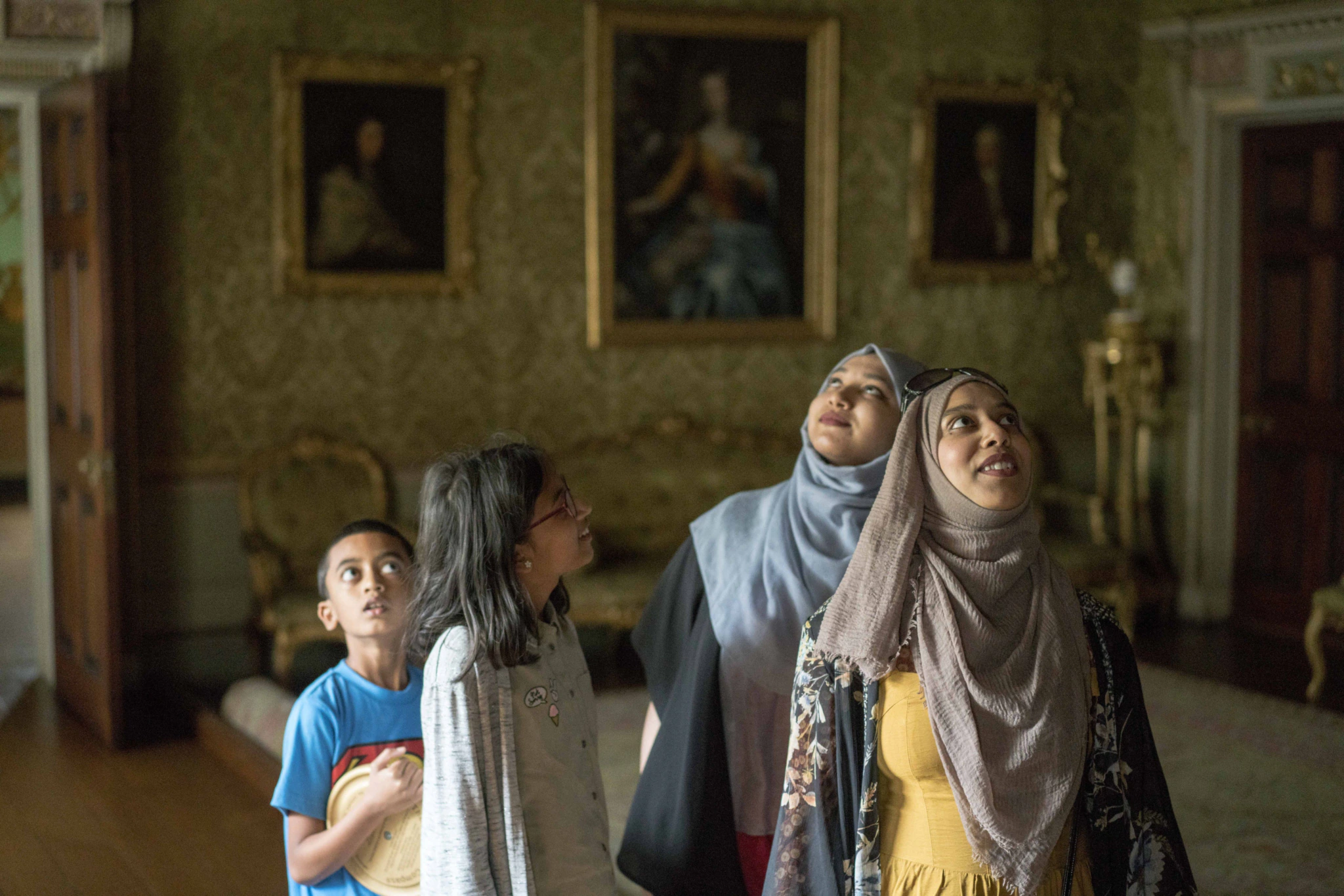 Visitors exploring the house at Osterley Park and House, London