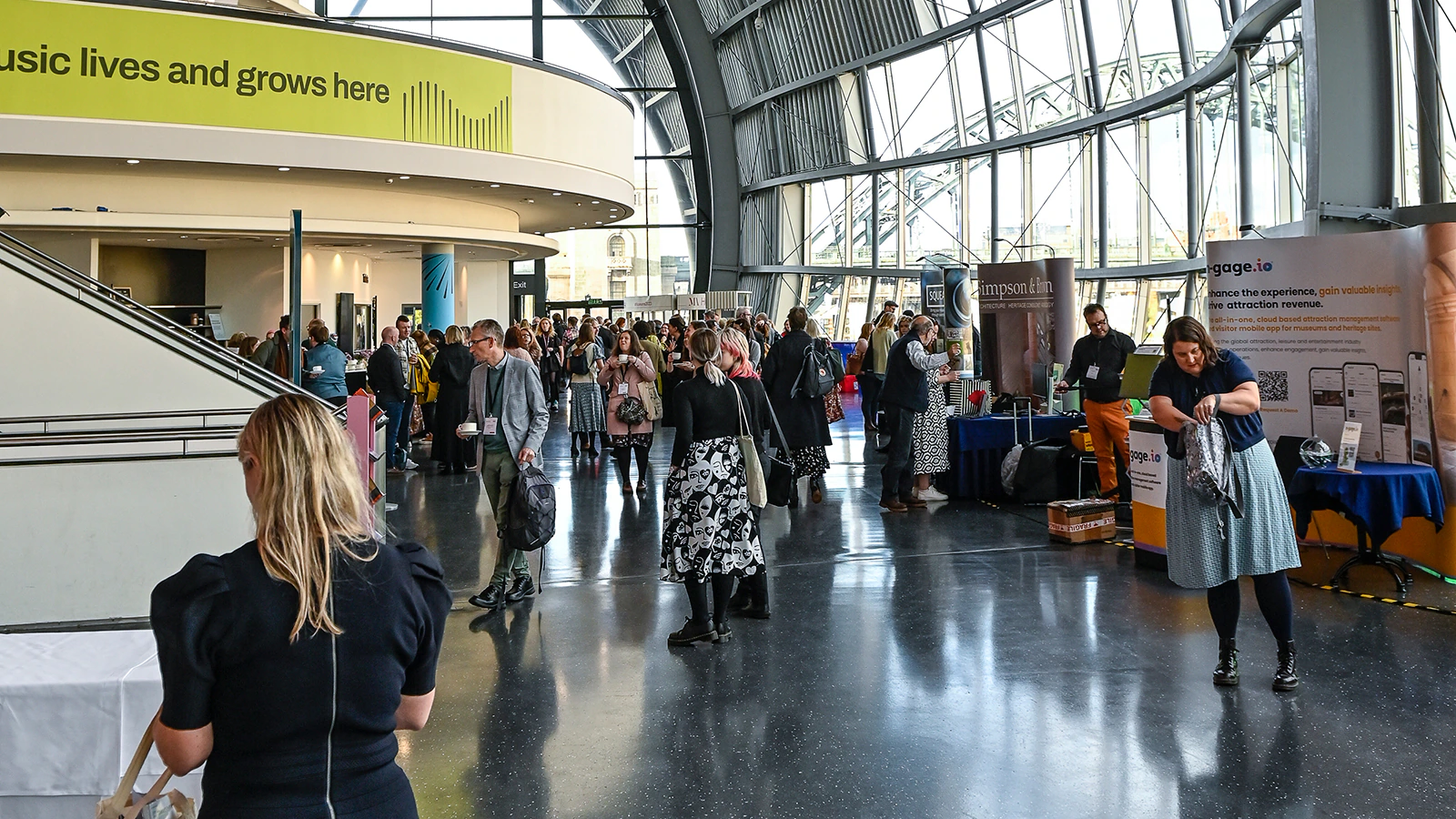 People gather in a conference atrium