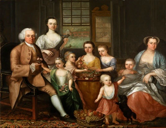 A formal 18th-century family portrait shows a man seated, women and children standing or sitting around him, with one woman holding a guitar. A dog and baskets of fruit are also present in the scene.