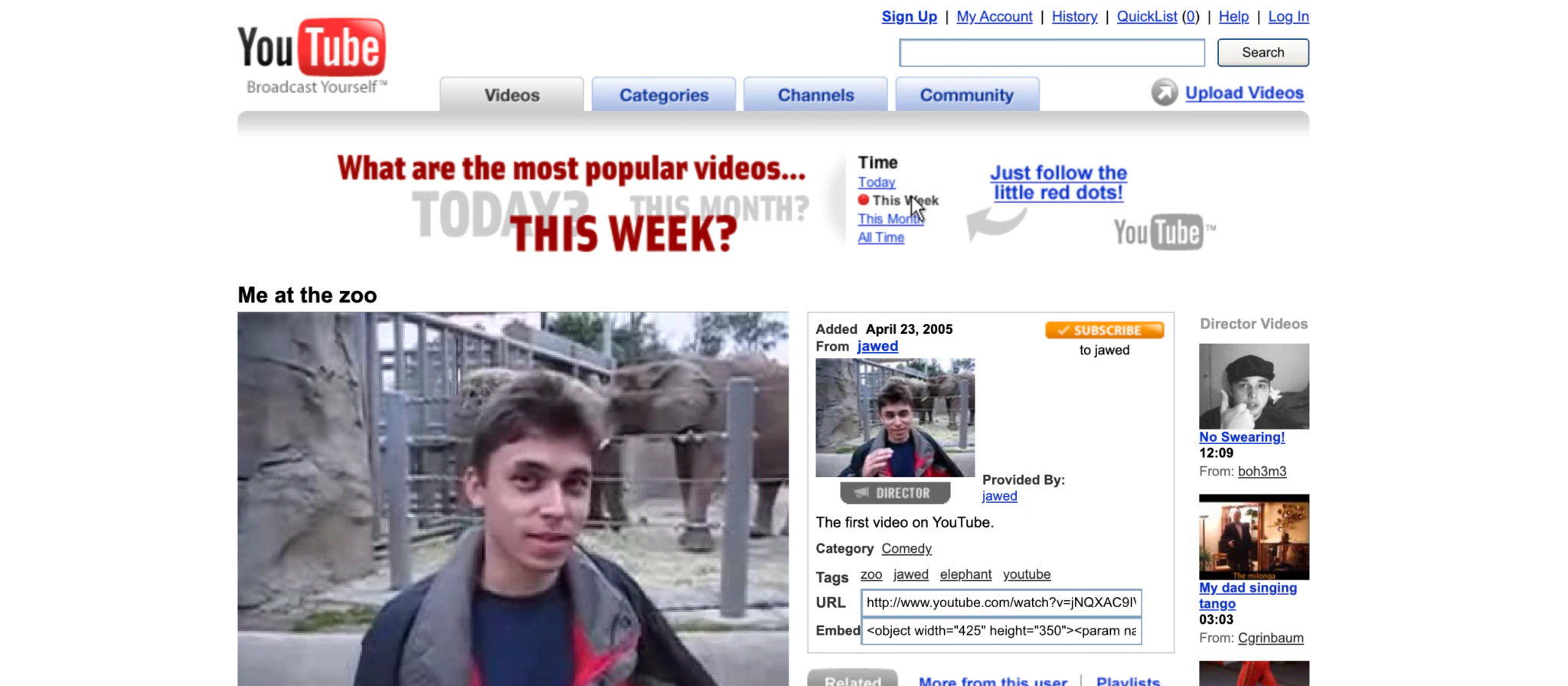 Screenshot of YouTube’s old interface showing the first video ever uploaded, titled “Me at the zoo,” featuring a person standing in front of elephants at a zoo. The page shows video details and early YouTube features.