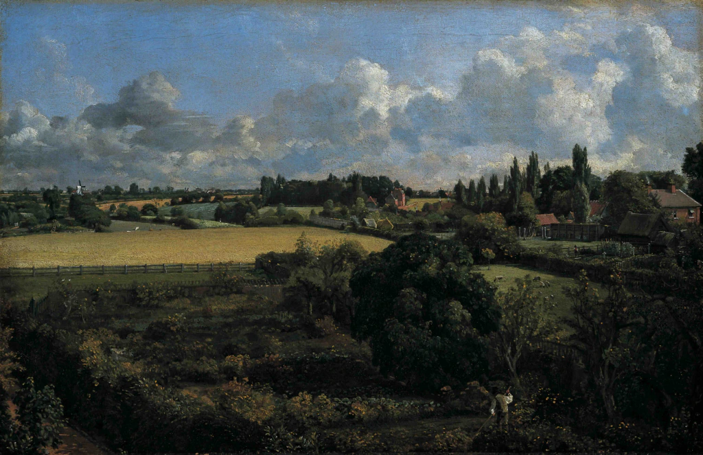 A rural landscape with fields, trees, hedges, and scattered houses under a cloudy sky. A person stands in an orchard in the foreground, while distant buildings and a windmill appear on the horizon.