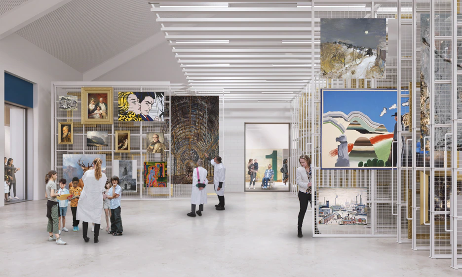 People, including children and adults in lab coats, view various artworks displayed on tall wire racks in a bright gallery space with white walls and ceiling.