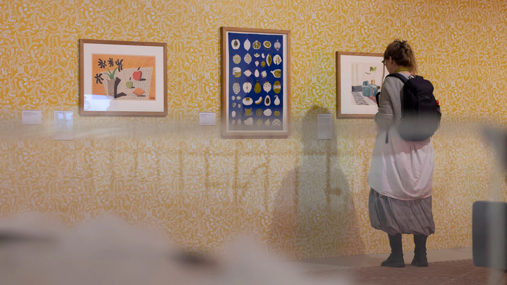 A person looks at a gallery wall space at the Whitworth